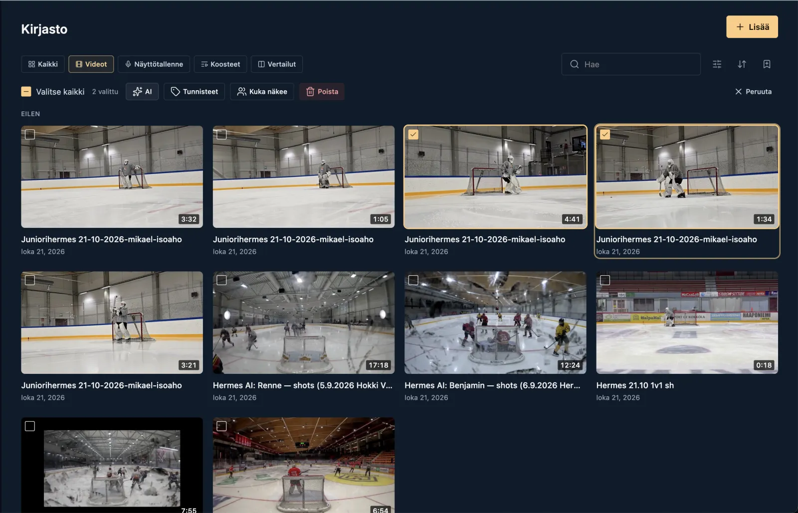 The library in selection mode with two videos selected and the AI button in the selection bar
